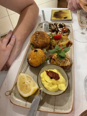 Vegan board - caponata, chickpea burger, arancini, parmigiana & homemade mayo   at Rosmarino in Taormina