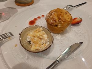 An amazing dessert with hints of orange. I forgot what it's called. at Rosmarino in Taormina