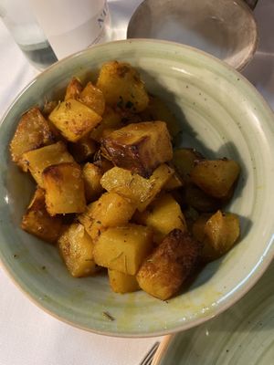 Salt potatoes with turmeric and rosemary   at Rosmarino in Taormina
