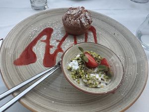 Orange cake with vegan cream sooo yummy - I usually don’t eat dessert but the lovely charming waitress convinced me and I’m so glad I tried it!  at Rosmarino in Taormina