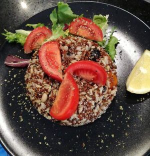 cold dish with quinoa, beans and fresh tomato at Capriccio Siciliano in Cefalu