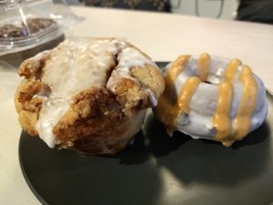 Cinnamon roll & pumpkin cheesecake donut at Rise Authentic Baking Co in Grand Rapids