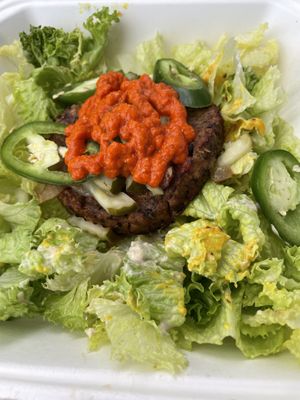 Spicy jalapeño black bean burger salad style   at Raw in Milpitas