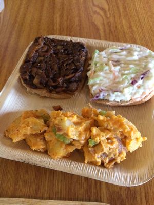 Bbq sandwich with cole slaw and potato salad  at Magic Vegan Cafe in Gulfport