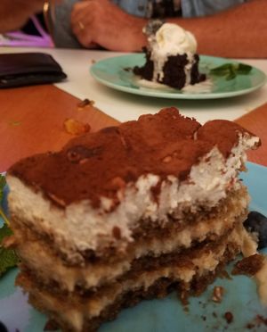 Sticky toffee pudding and tarramasu. at Genesis Plant Based Alchemy in North London