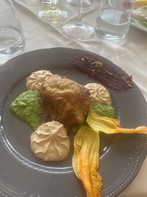 crepe ai fiori di zucca con ricotta di mandorla e piselli  at Trattoria al Pirio in Torreglia