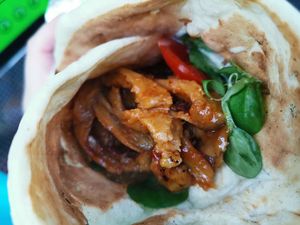 'Buffano Wings' in wrap with salad. at Sun of Seitan in Newcastle Upon Tyne