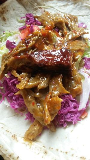 Fabulous buffalo wings in flat bread with salad at Sun of Seitan in Newcastle Upon Tyne