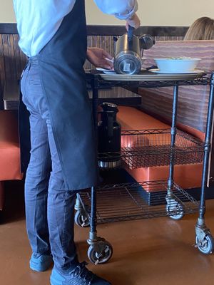 They add the hot broth table side  at Little V's Vietnamese Bistro in Katy