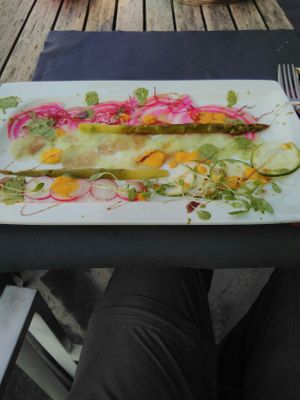 First course (red cabbage slices, radish slices, courgette slices) at Au Goût du Jour in Eupen
