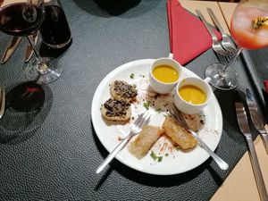 Nice greeting from the kitchen, pumpkin soup, bread with tapenade and spring roles at Au Goût du Jour in Eupen