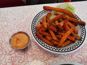 Sweet Potato Fries with vegan Sauce at American Dream Diner in Geneva