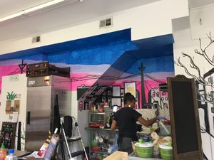 Mural behind “kitchen” at Bmore Righteous in Baltimore