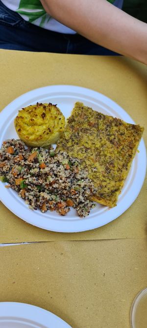 Quinoa salad, traditional Italian chickpea bread thong, cauliflower gratin at Clorophylla Veg & Bio Shop in Pisa