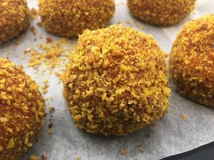 Tomato, capers, olives and turmeric meatballs at Clorophylla Veg & Bio Shop in Pisa