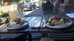 Vegan waffles and orange juice. at Cafe Nomad - Weststadt in Heidelberg