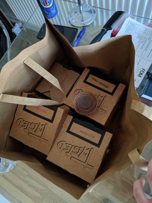 The boxes of deliciousness (plastic tub of BBQ sauce on the top, the rest came in cardboard!) at Twisted London in East London