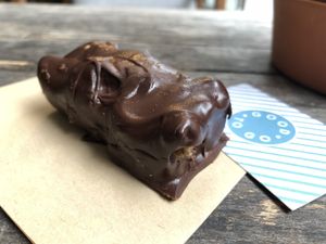 Raw date, almond butter and peanut “snickers” bar.  at Good To Go - The Bower in London