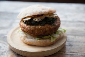 FRANCE Burger! Traditional plain omelette made from free range eggs, potatoes and onions sourced from local farmers, all served inside fresh, crusty ciabatta bread with lettuce, tomato, gherkins , SPINACH cooked in honey, BLUE CHEESE and house sauces (salsa brava and alioli at Capitan Veggie in East London