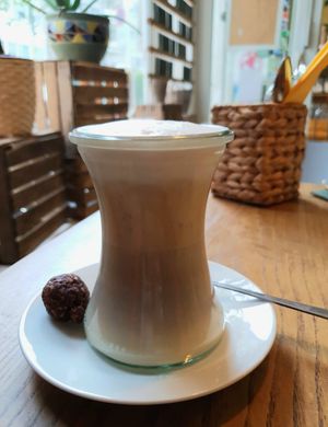Latte Macchiato with soy milk and energy ball at Pure Note in Dusseldorf