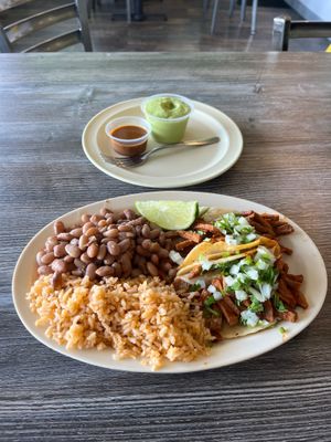 Taco combo with sad $5 guacamole in the back at Mami Cheli's in Menlo Park