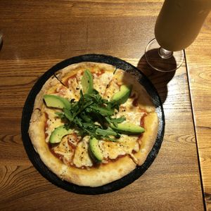 Avocado pizza and summer smoothie at Veggie Castle in Macau