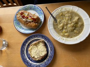 Leek and potato soup with hot dog  at Greens Vegan Cafe & Shop in Stourport-on-severn