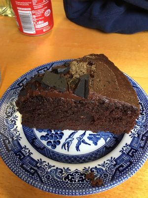 Chocolate fudge cake, massive piece and very nice  at Greens Vegan Cafe & Shop in Stourport-on-severn