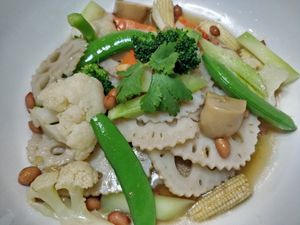 Stir fry lotus root with mixed vegetables at Mother Earth 大地之素 in West Singapore