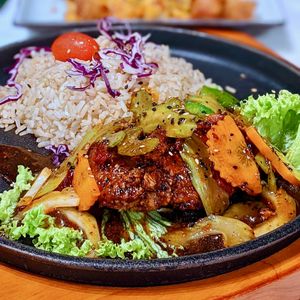 Hotplate Black Pepper Chicken Cutlet Rice  at Mother Earth 大地之素 in West Singapore