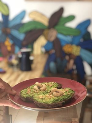 Avocado toast with special bread at Imagine Café in Paris