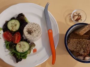 Cashew cheese, salad and bread at Imagine Café in Paris