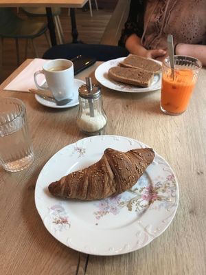 Breakfast croissant and tartines at Be Kind Cafe in Geneva