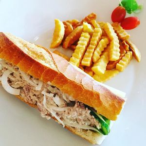 (Vegetarian) Creamy tuna sandwich with crispy baguette bread and French fries at Backstage Bar & Grill  in Phan Thiet