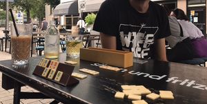 Vegan iced coffee, playing games on  terrace  at Locals in Tilburg