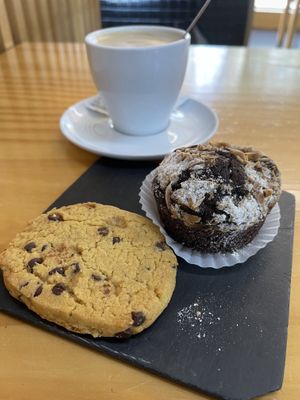 Vegan cookie and muffin with coffee (with plan based milk)  at Pãodock in Porto
