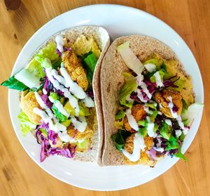 Tacos con cauliflower wings at Melamangio in Mendrisio