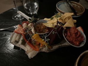 A nice appetizer platter with pickled vegetables and dips  at The Juniper Bistro in Banff