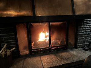 So cozy next to the fire 🔥 place   at The Juniper Bistro in Banff