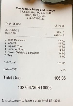 Dinner check with meal pricing at The Juniper Bistro in Banff