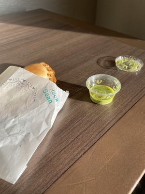 Don’t forget to use the green sauce😄  at Jessy's Pastries in Westbury