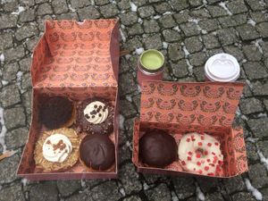 Specials: Sachertorte, Chocolate Cream, Orange Almond Fudge, Boston Cream + Matcha Latte and Cappuccino  at Brammibal's Donuts - Potsdamer Platz in Berlin
