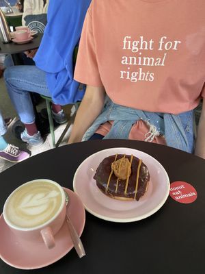 Donut Peanutbutter & Chocolate + Cappucino with soy milk  at Brammibal's Donuts - Potsdamer Platz in Berlin