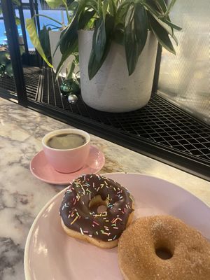 Choc sprinkles, Cinnamon Sugar & an Americano  at Brammibal's Donuts - Potsdamer Platz in Berlin