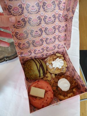 From top-left (clockwise): Mozertkugel, Rhubarb Crumble, Carrot Cake, Strawberry NY Cheesecake at Brammibal's Donuts - Potsdamer Platz in Berlin