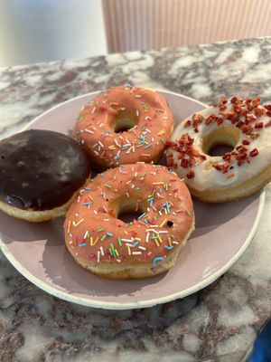 White Chocolate, Strawberry Sprinkles and Boston Cream (filled with vanilla cream)   at Brammibal's Donuts - Potsdamer Platz in Berlin