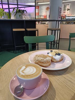 Two donuts and a cappuccino at Brammibal's Donuts - Potsdamer Platz in Berlin