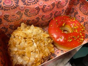 Bienenstich in donut form (bee sting cake) and raspberry pistachio at Brammibal's Donuts - Potsdamer Platz in Berlin