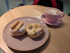From left to right: french toast donut (4⭐), apple crumble donut (5⭐) and hot chocolate (4⭐) at Brammibal's Donuts - Potsdamer Platz in Berlin