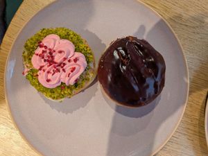 Raspberry pistachio and Boston creme at Brammibal's Donuts - Potsdamer Platz in Berlin